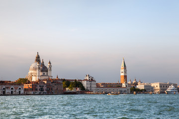 Fototapeta na wymiar sunset on Grand canal and bell tower of San Marco, Venice