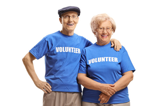Senior volunteers smiling at the camera