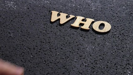 Who are you, business motivational inspirational quotes; wooden words typography lettering concept