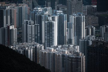 Fototapeta na wymiar Hong Kong - March 26 2020 : Hong Kong cityscape and skyscraper modern building, view from mountains of Hong Kong
