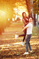 Fototapeta premium Young couple have fun in sunny day