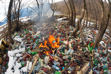 Spring flood and shore with garbage
