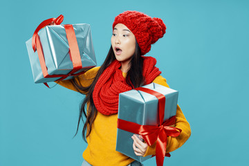 young woman with gift boxes