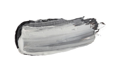 Abstract acrylic black and white color smear brush stroke. Isolated on white background.