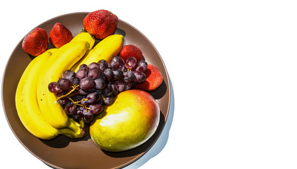Tropical fruits in a plate picture image