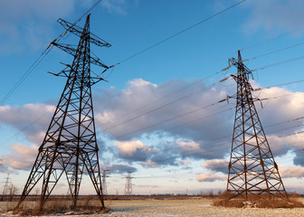 Power lines during a beautiful winter sunset.