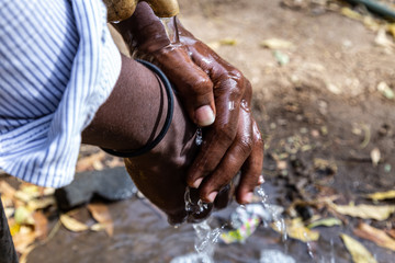 Africa coronavirus pandemic prevention wash hands with soap warm water and , rubbing nails and...