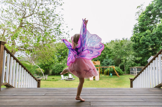 Young Girl Dancing in Purple Butterfly Costume