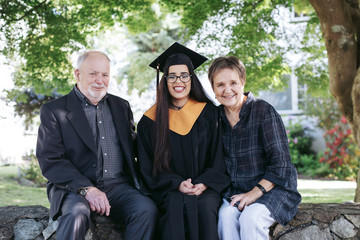 Grandparents celebrating their grand daughters high school gradu