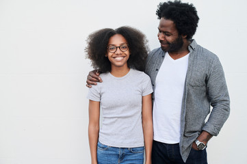 Proud afro dad tween daughter.