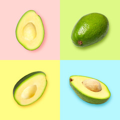 Creative layout with ripe avocado halves on multi-colored background. Healthy food, diet, tropical exotic fruit, trendy food product. Minimalistic summer food concept. Organic avocado. Pop art design