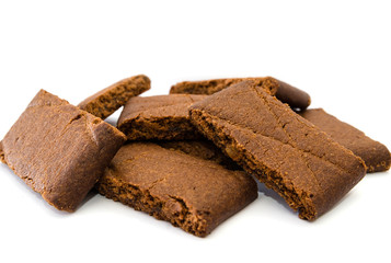 Tasty cookies with jam on a white background.