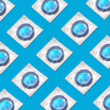 Condoms packing pattern on a blue background.