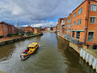 canal in Leeds with taxi boat
