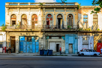 Havana Cuba Typical collection of old vintage colored houses in downton with a sunny blue sky.