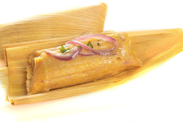 Typical Homemade Tamales Isolated on a White Background