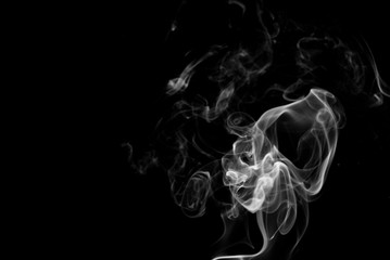 Picture of white cigar smoke in black view