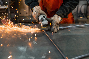Crop welder grinding metal frame