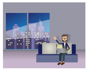 Man with laptop sits on sofa at night