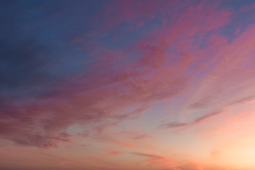 Naklejka na ściany i meble Evening Colorful Sky with Clouds. Sweet Heaven. Purple Texture. Abstract Background. Pastel Pink Color. Golden Hours Sky. Nature Wallpaper. Beautiful Sunset or Sunrise. Scenic Morning. Gradient
