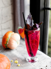 dark opal basil beverage garnished with basil leaves