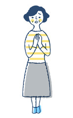 困っている表情のシニア女性