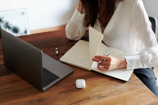 Businesswoman reading her notes.