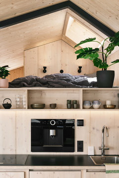 Kitchen and Bedroom in Stylish Wooden Tiny House