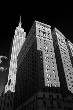 Apartment buildings and skyscraper on street