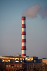 smoke from the chimney of an industrial plant