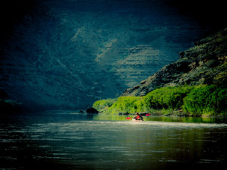 kayaking through a canyon