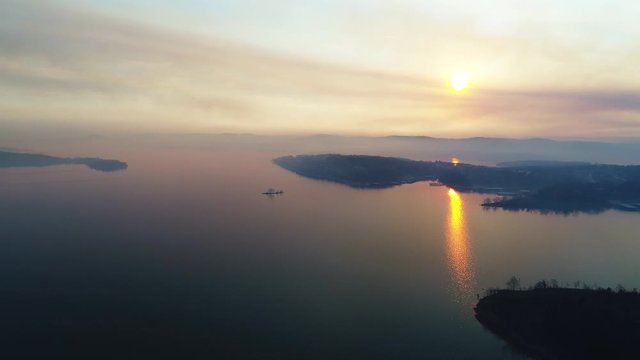 Wide aerial, sunset over Table Rock lake