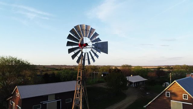 Aerial, windmill outside farm houses