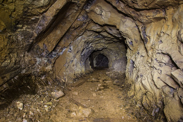 Underground abandoned platinum ore mine tunnel
