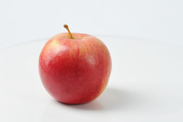 red Apple on a white background - side view of a juicy Apple
