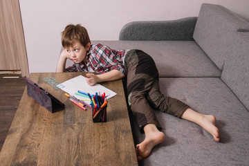 the guy sits on the couch at home and goes through online training