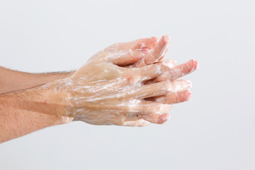 man washing hands isolated over white background