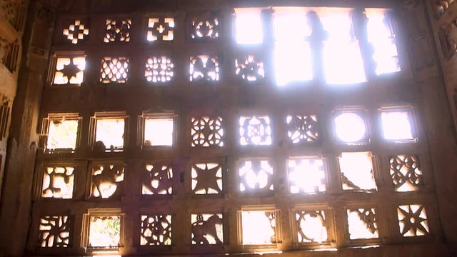 View of the window of the Jain Temple at Polo Forest in Abhapur, Gujarat, India