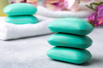 Obraz na płótnie Canvas Bar of natural handmade soap, towel and spa objects, close up