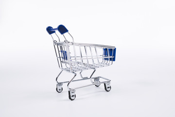 shopping cart on isolated white surface