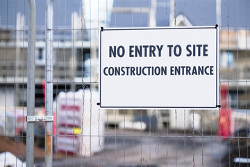 No entry or parking for contractors at building site entrance