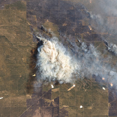 Wildfire from aerial. Fire and smoke. Forest fire. (Elements of this image furnished by NASA)