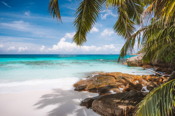 Vacation holiday landscape of prisine tropical paradise beach with crystal clear blue water,...