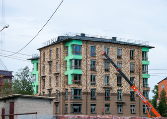 Provincial poor city. The construction of a new brick residential building.