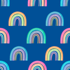 Seamless pattern of multi-colored rainbows on a blue background