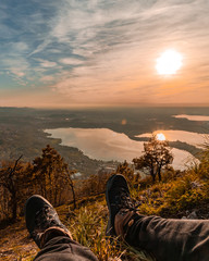 Sunset view from Monte Barro,Relaxing on top of a small mountain with lake and clouds Oct-27-2019
