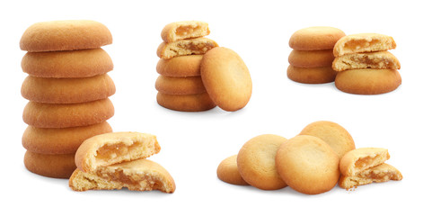Set of delicious shortbread cookies with filling on white background
