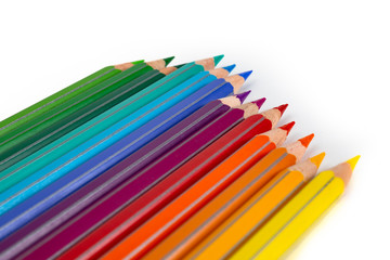 Colored pencils isolated on white. Macro still-file picture made in studio with softbox.