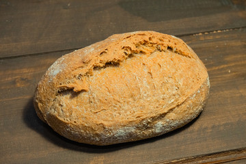 close up of dark bread on table