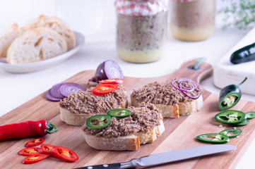Homemade liver pate on white bread slices